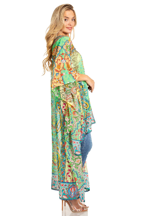Woman wearing a colorful patterned dress on a white background