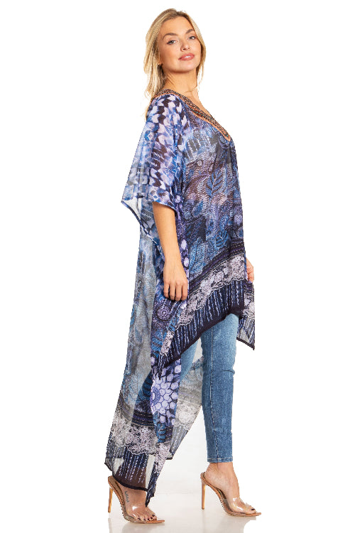 Woman wearing a blue patterned kimono-style garment on a white background
