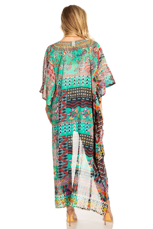 Woman wearing a colorful patterned dress with a white background
