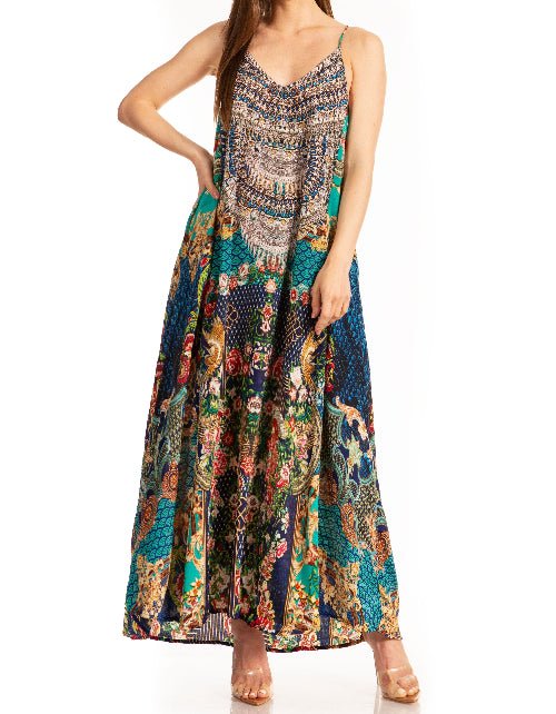 Woman wearing a colorful patterned dress on a white background