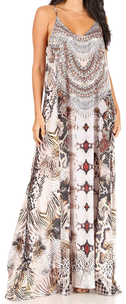 Woman wearing a long, patterned dress with a neutral background