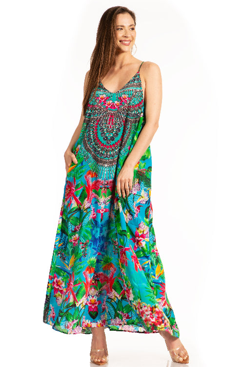 Woman wearing a colorful floral dress on a white background