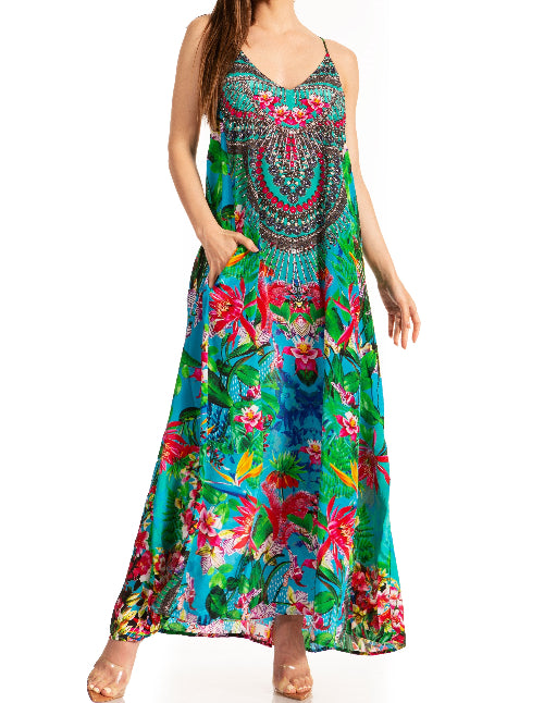 Woman wearing a colorful floral dress on a white background