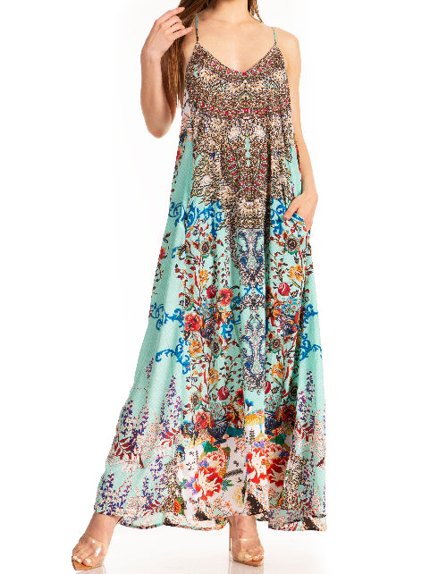 Woman wearing a colorful floral dress on a white background