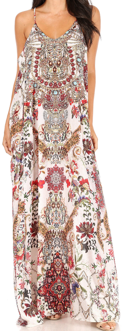 Long patterned dress with floral and paisley design on a white background