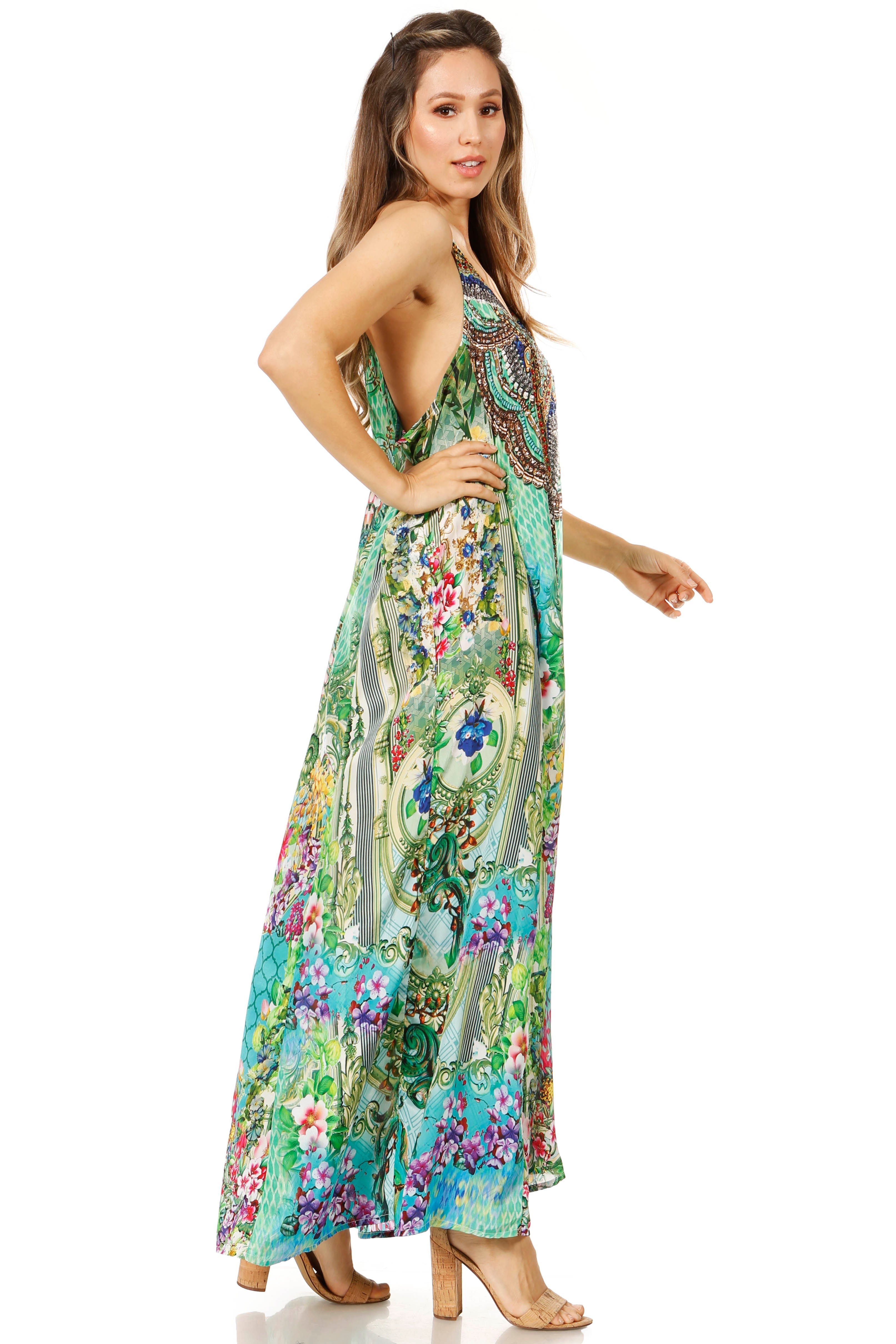 Woman wearing a colorful floral dress on a white background
