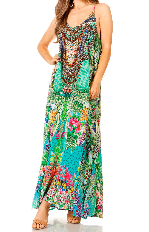 Woman wearing a colorful patterned dress on a white background