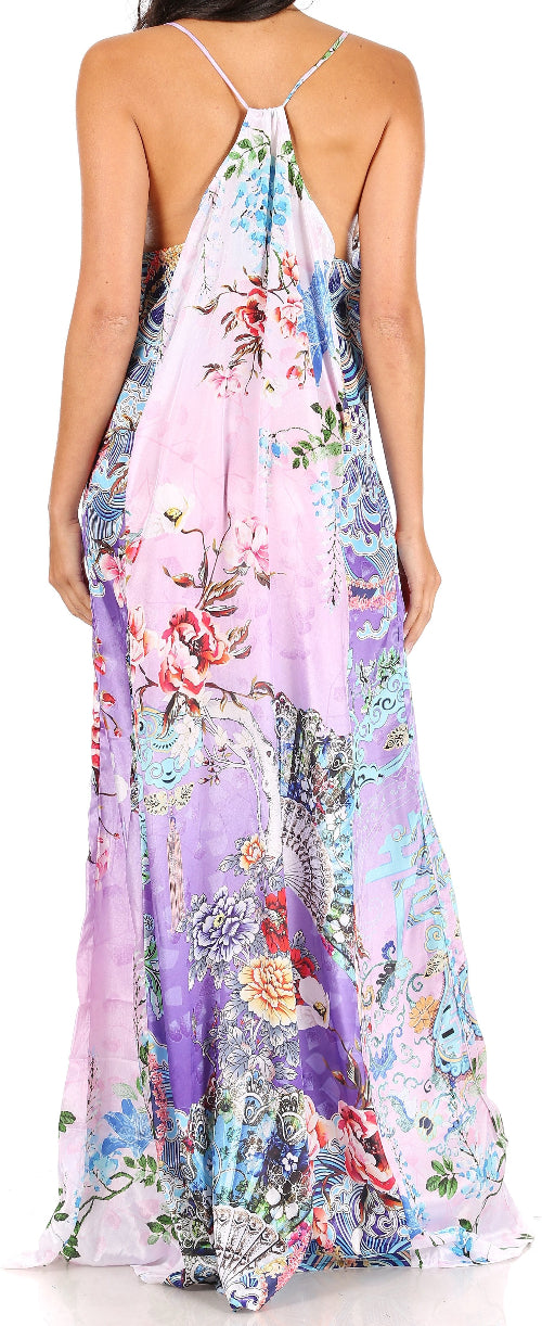 Woman wearing a colorful floral dress on a white background