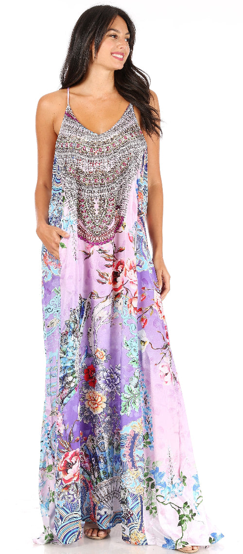 Woman wearing a colorful floral dress on a white background