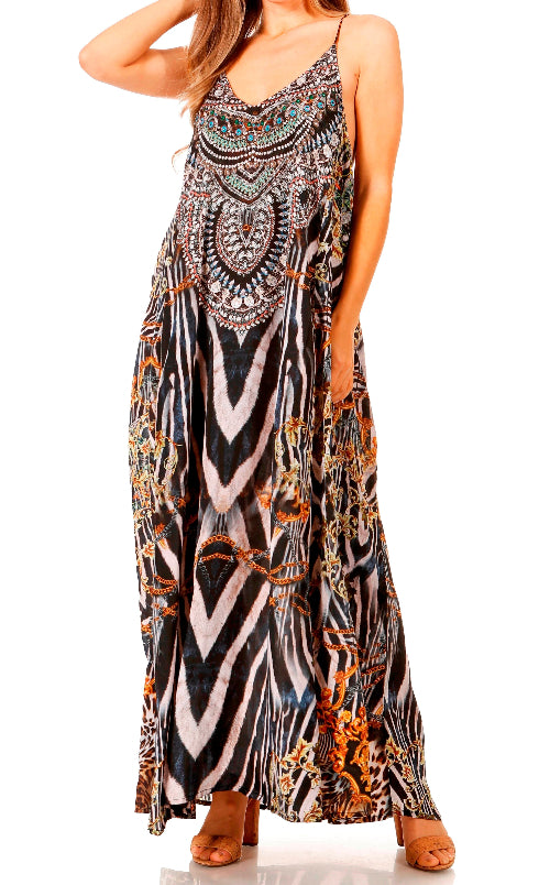 Woman wearing a long, patterned dress on a white background