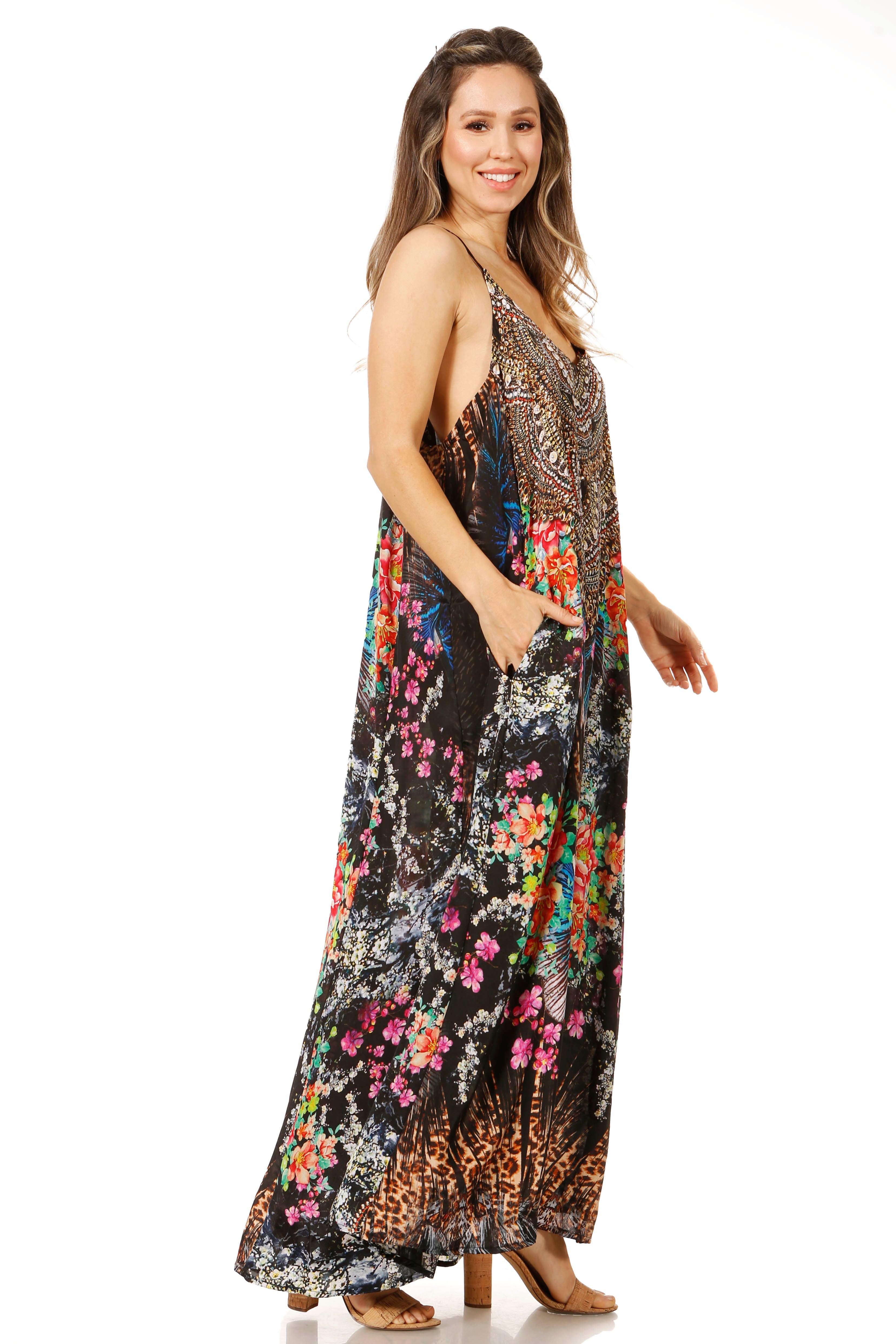 Woman wearing a colorful floral dress on a white background