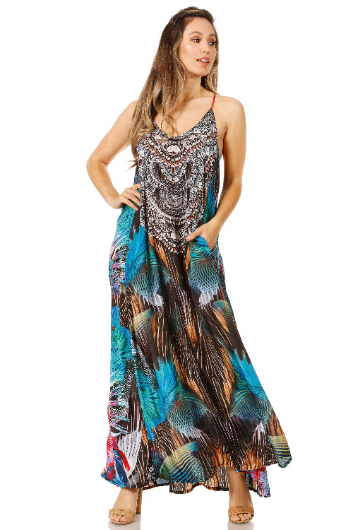 Woman wearing a long, patterned dress on a white background