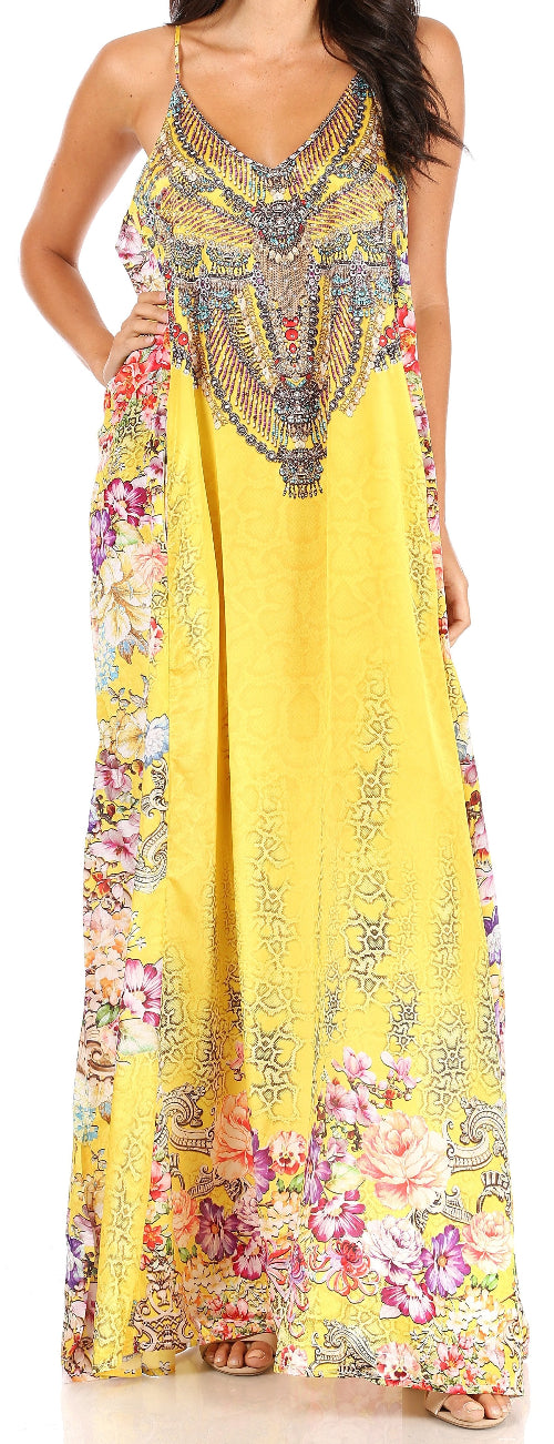 Yellow floral dress with intricate patterns on a plain background