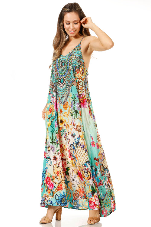 Woman wearing a colorful floral dress on a white background