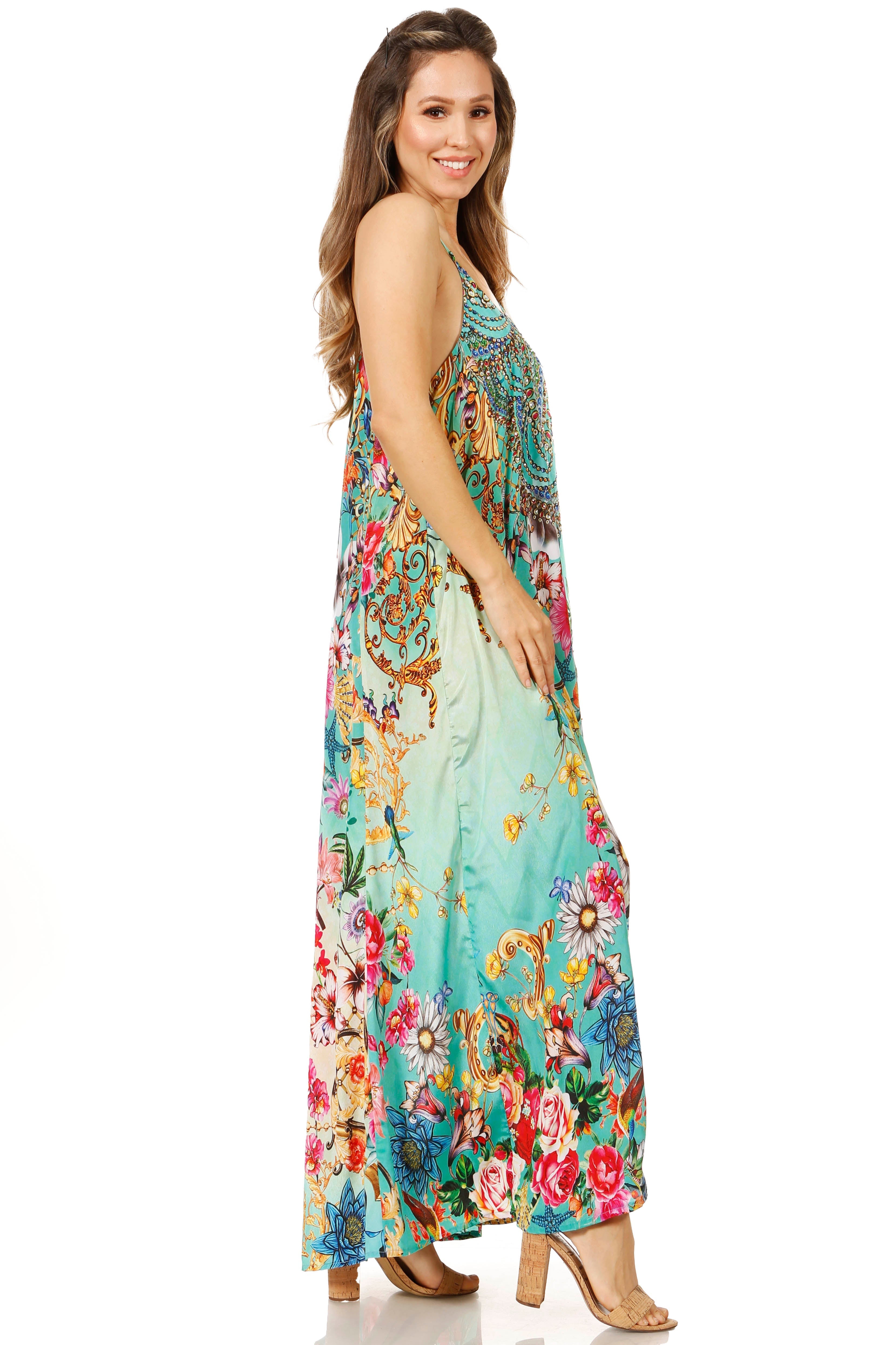 Woman wearing a colorful floral dress on a white background