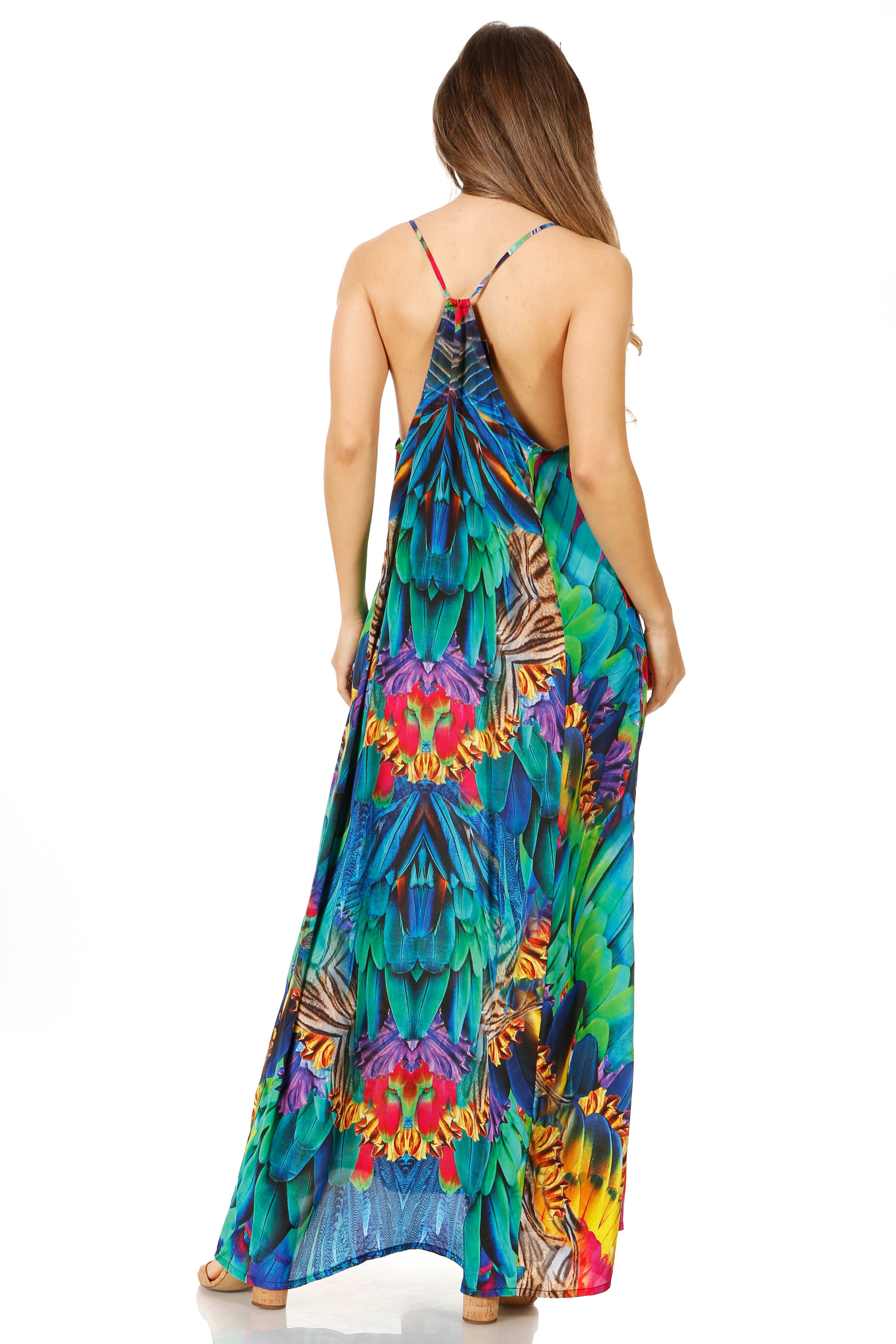 Woman wearing a colorful patterned dress on a white background