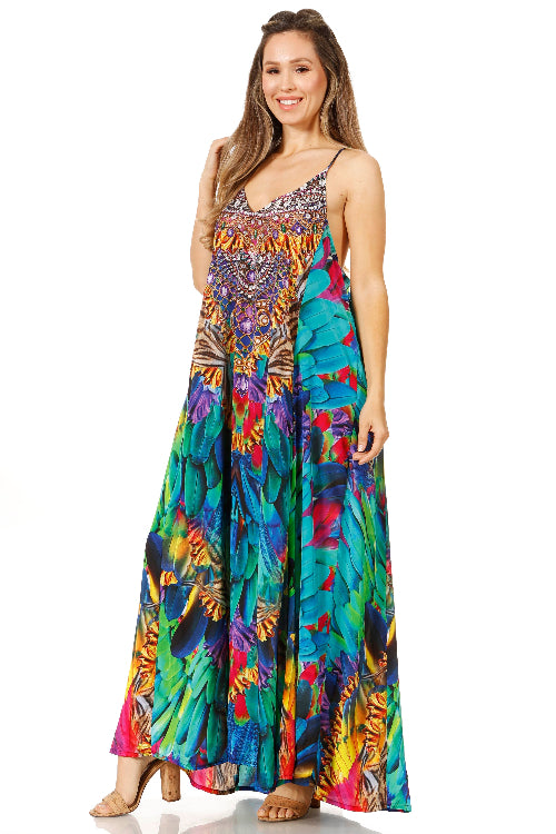 Woman wearing a colorful patterned dress on a white background