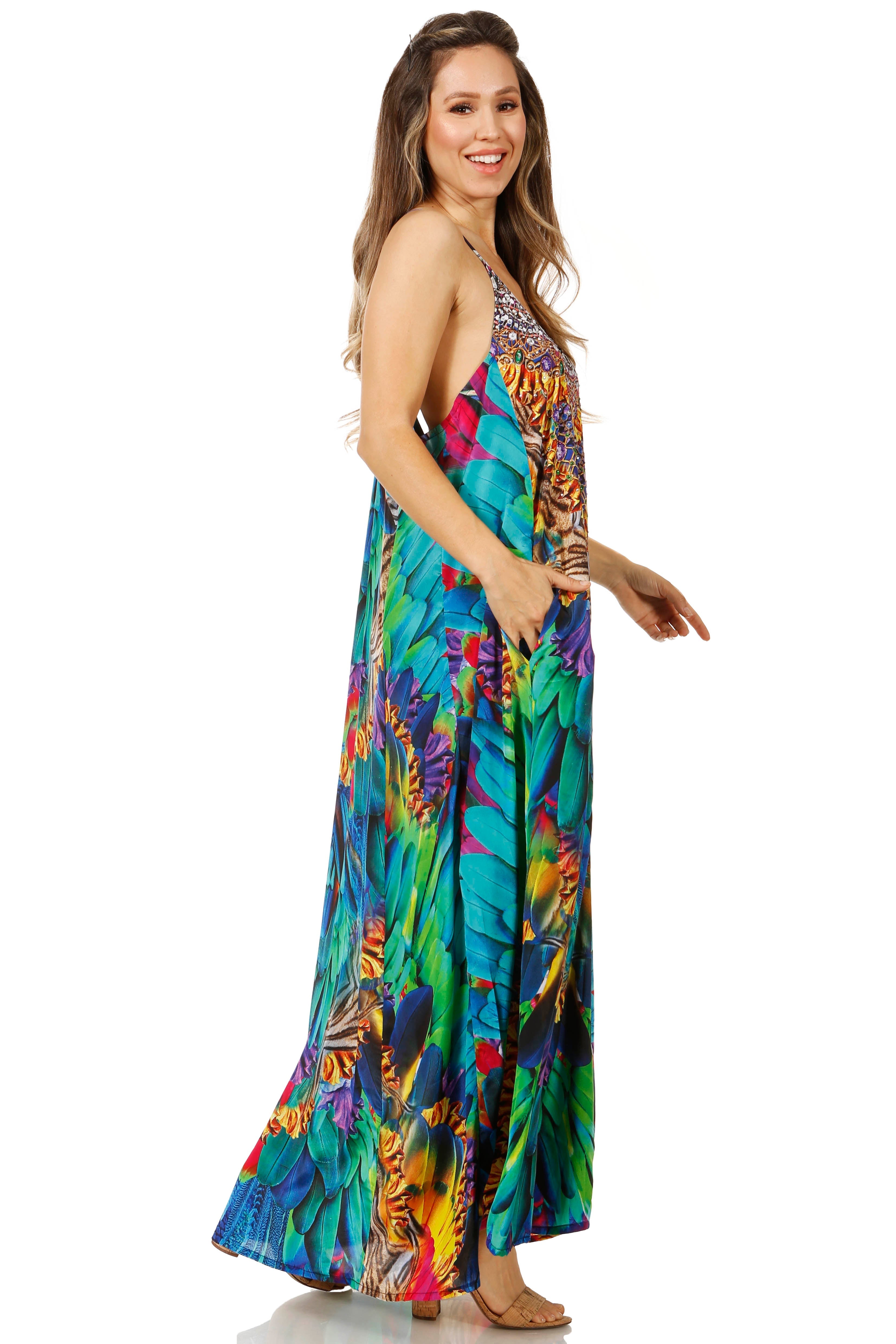 Woman wearing a colorful floral dress on a white background