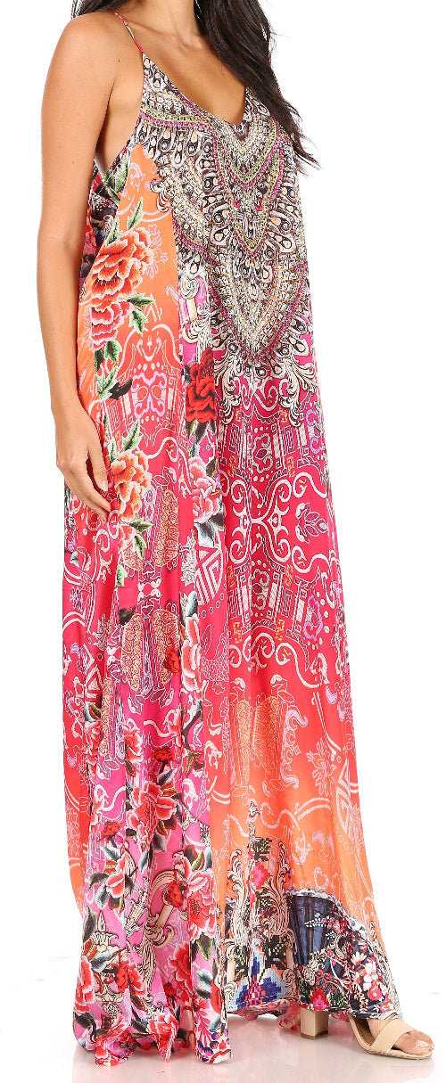 Woman wearing a colorful patterned maxi dress.