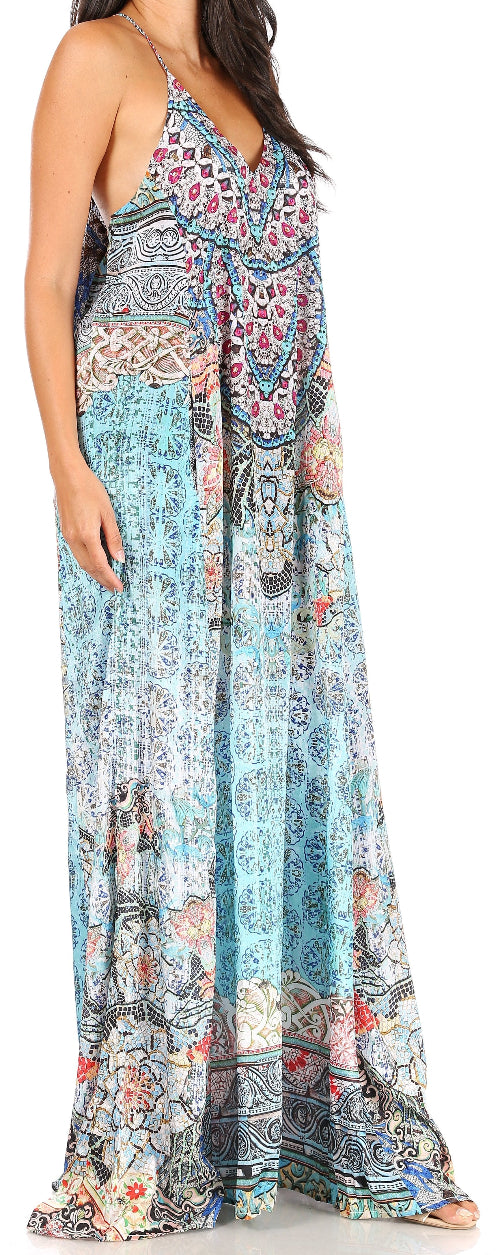 Woman wearing a long, patterned dress on a white background