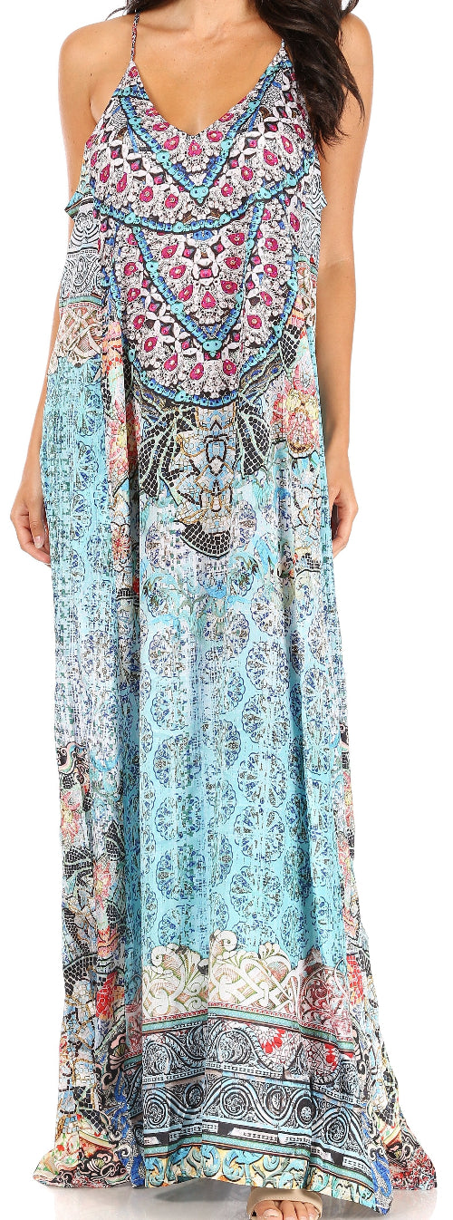 Woman wearing a long, patterned dress with a blue and multicolor design.