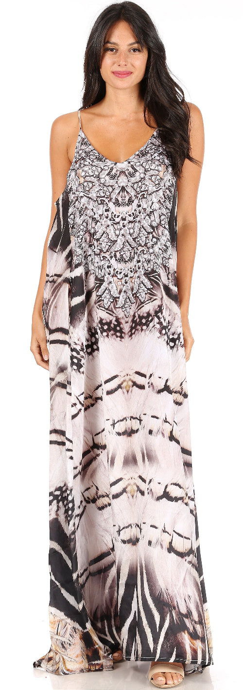 Woman wearing a long, patterned dress on a white background