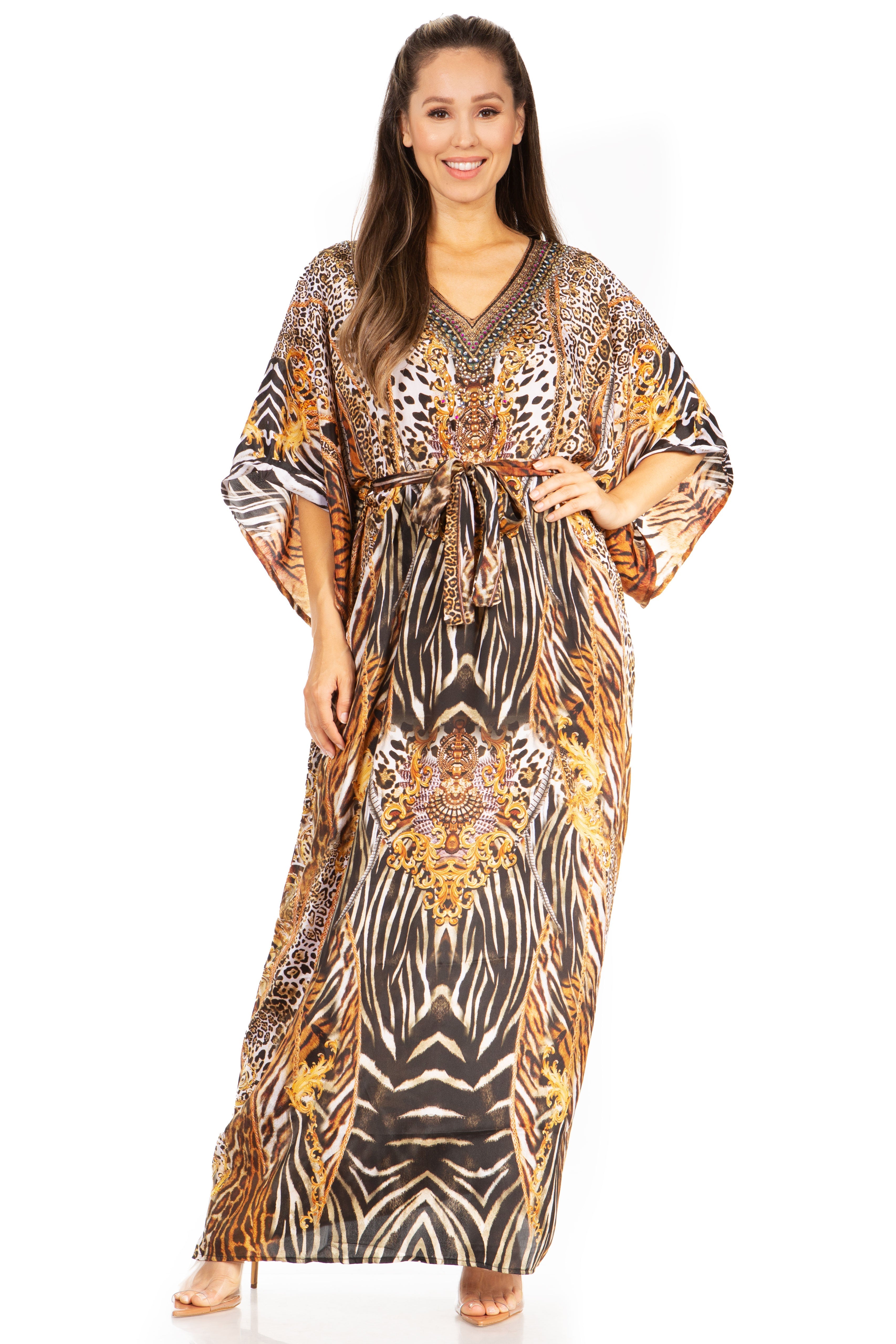 Woman wearing a patterned long dress on a white background