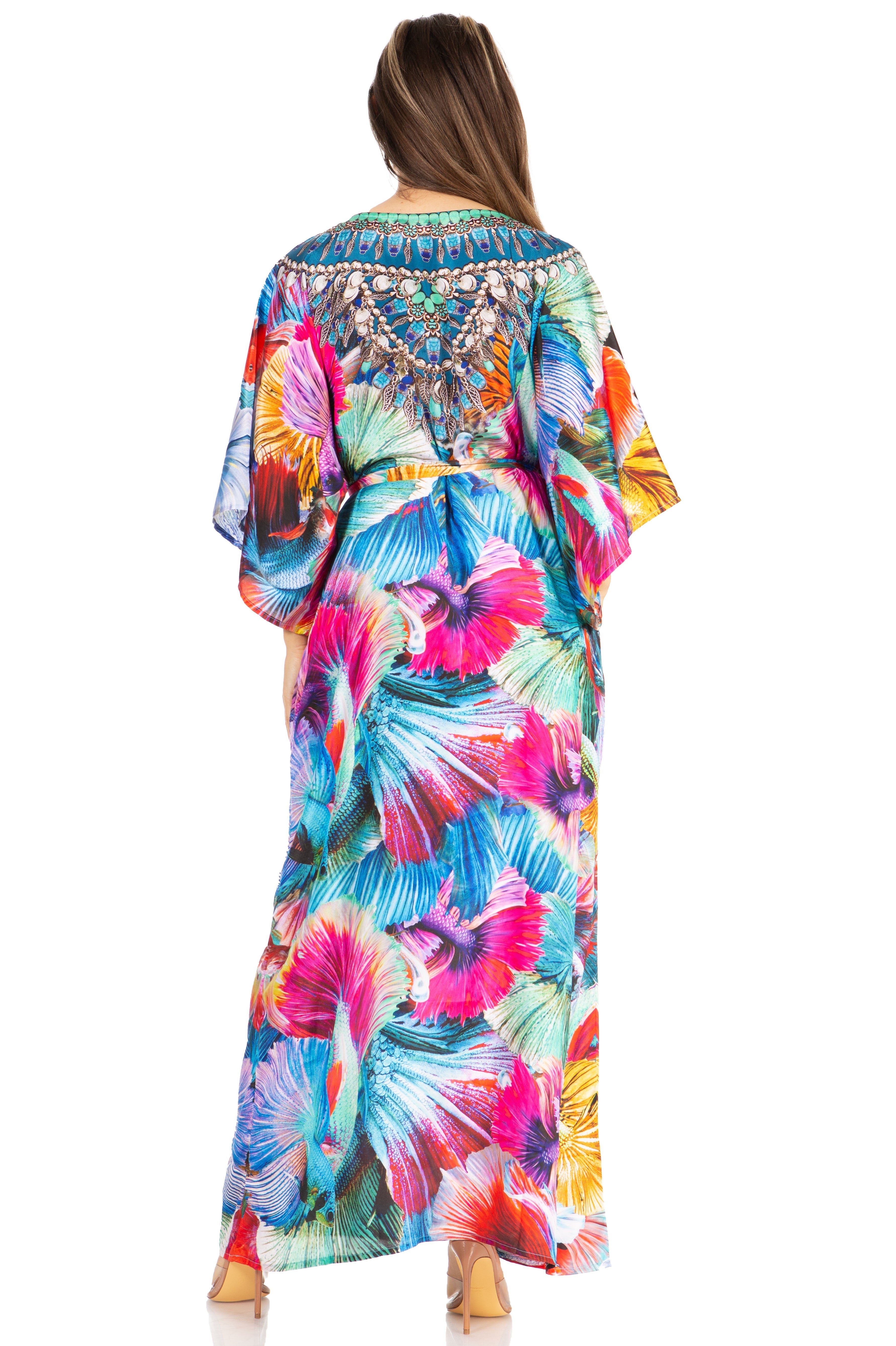Woman wearing a colorful, patterned dress on a white background