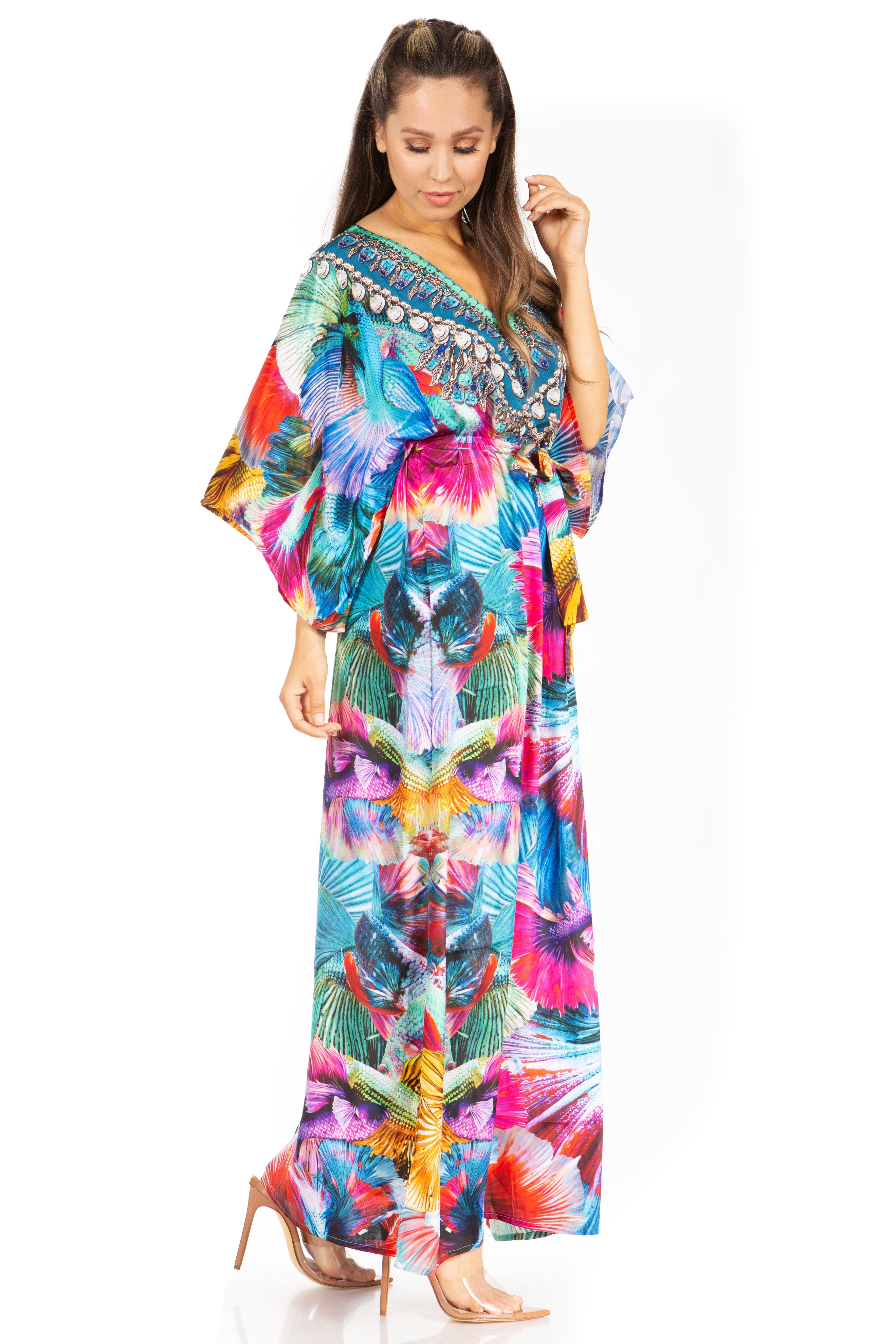 Woman wearing a colorful patterned dress on a white background