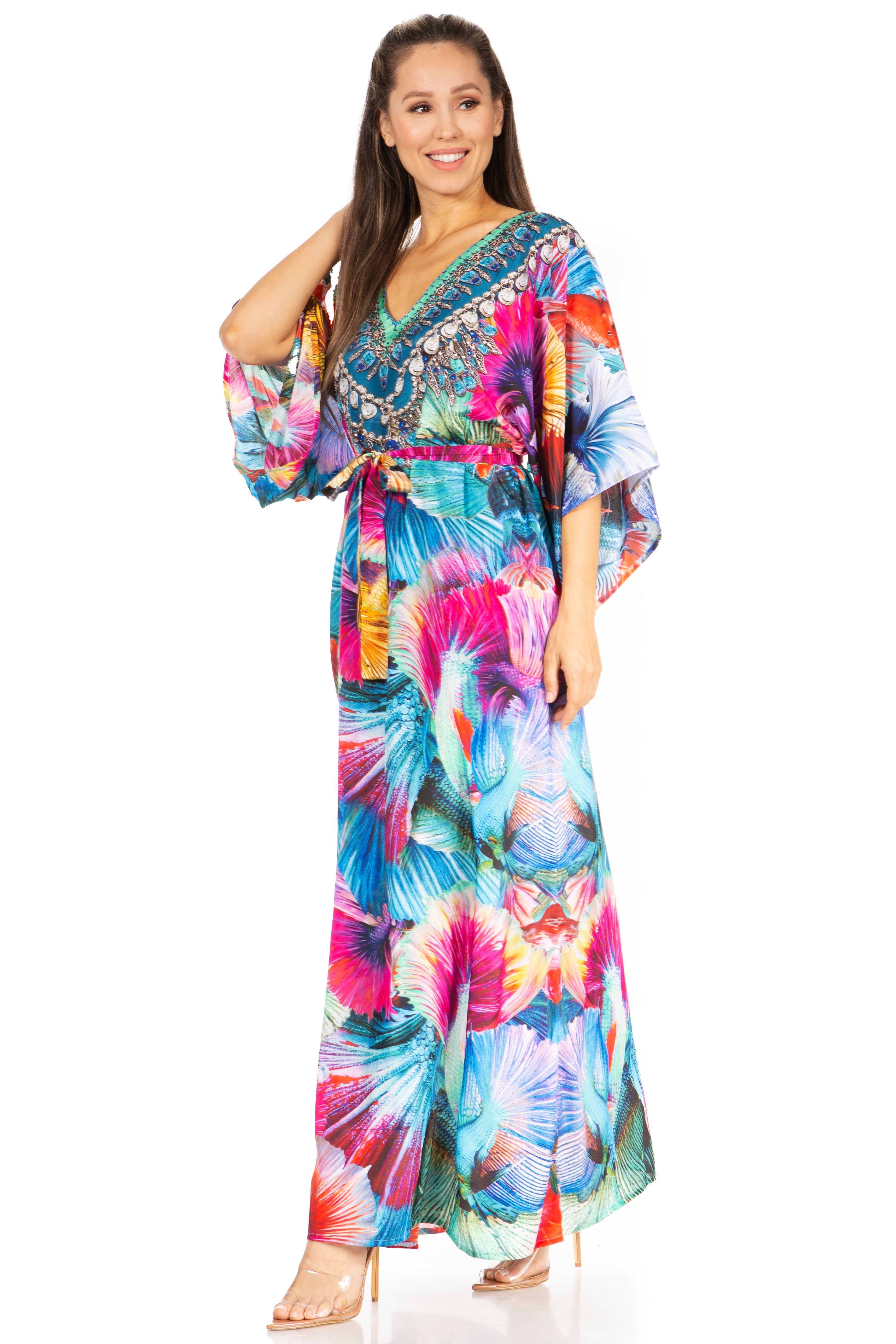 Woman wearing a colorful floral dress on a white background