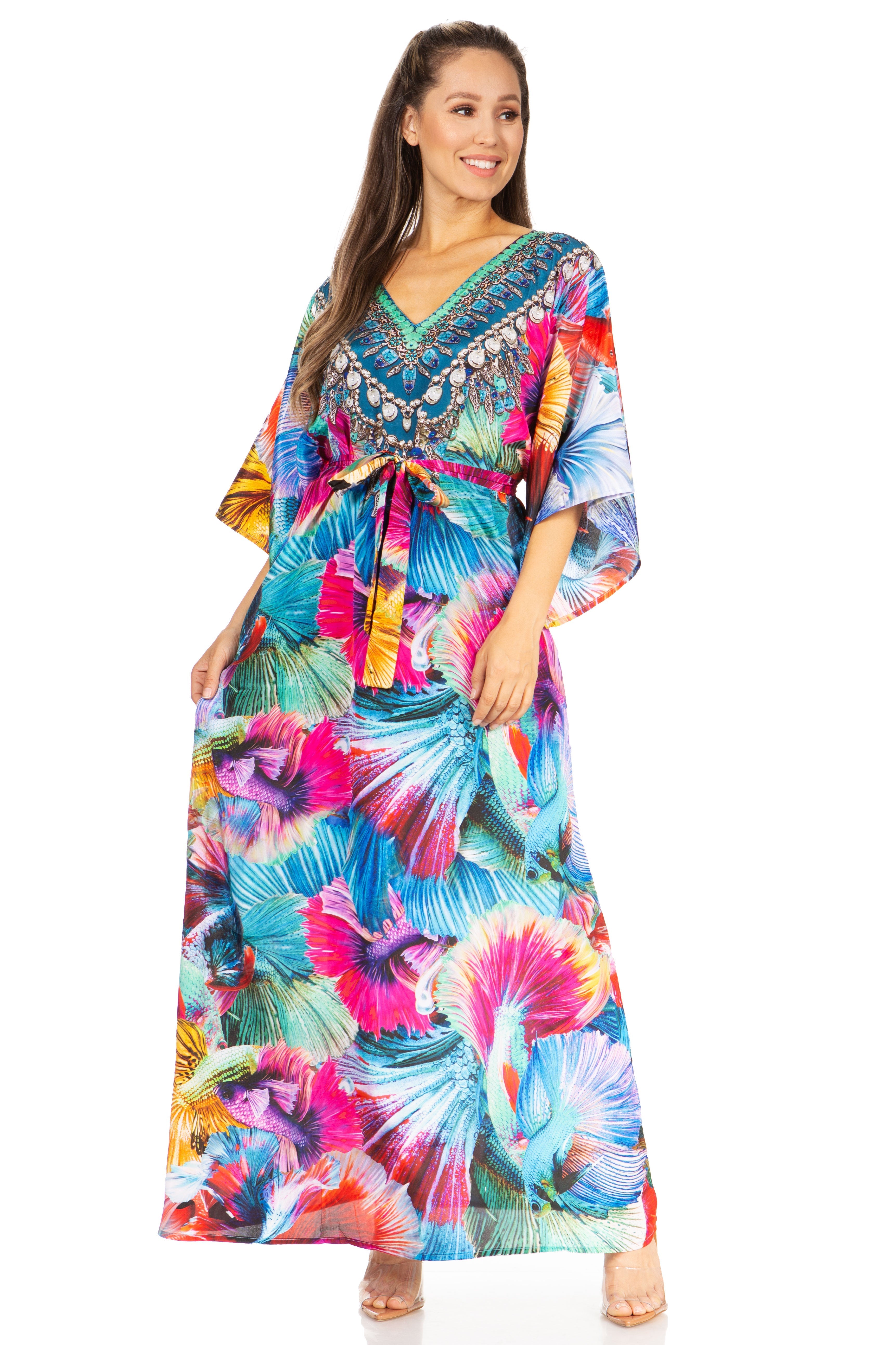 Woman wearing a colorful patterned dress on a white background