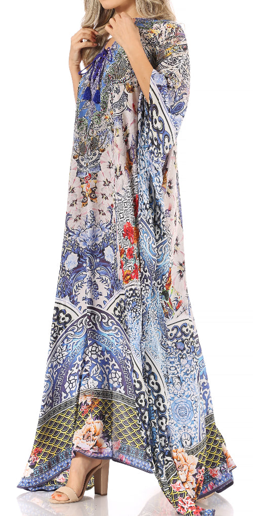 Long, patterned dress with floral and geometric design on a white background