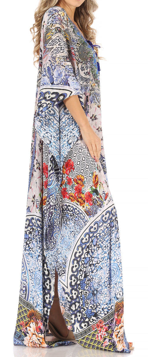 Long floral dress with a pattern of flowers and geometric shapes on a white background