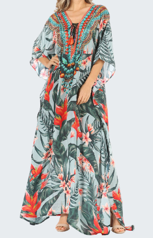 Long floral dress with a tropical pattern on a white background