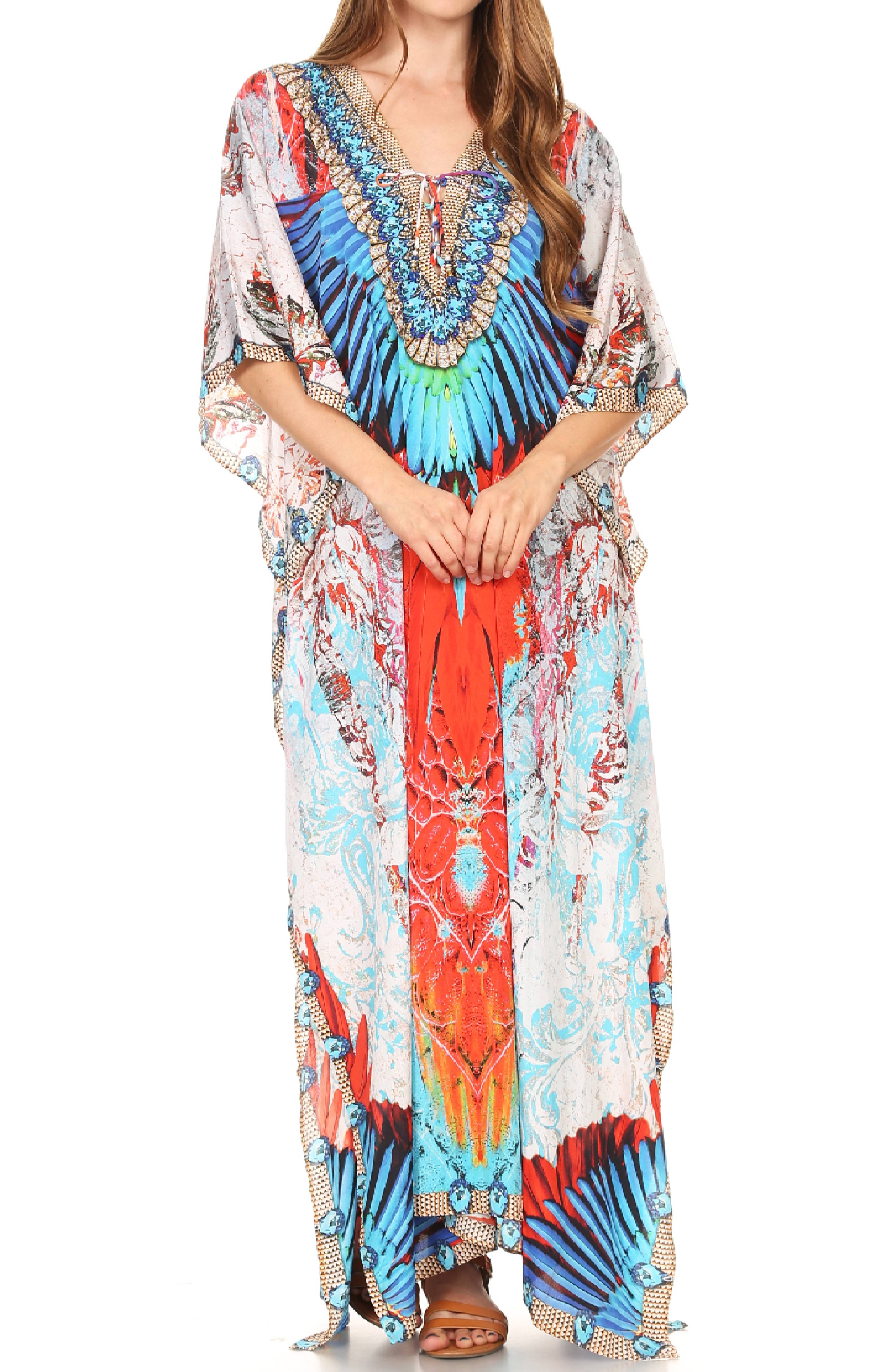 Woman wearing a colorful patterned dress on a white background