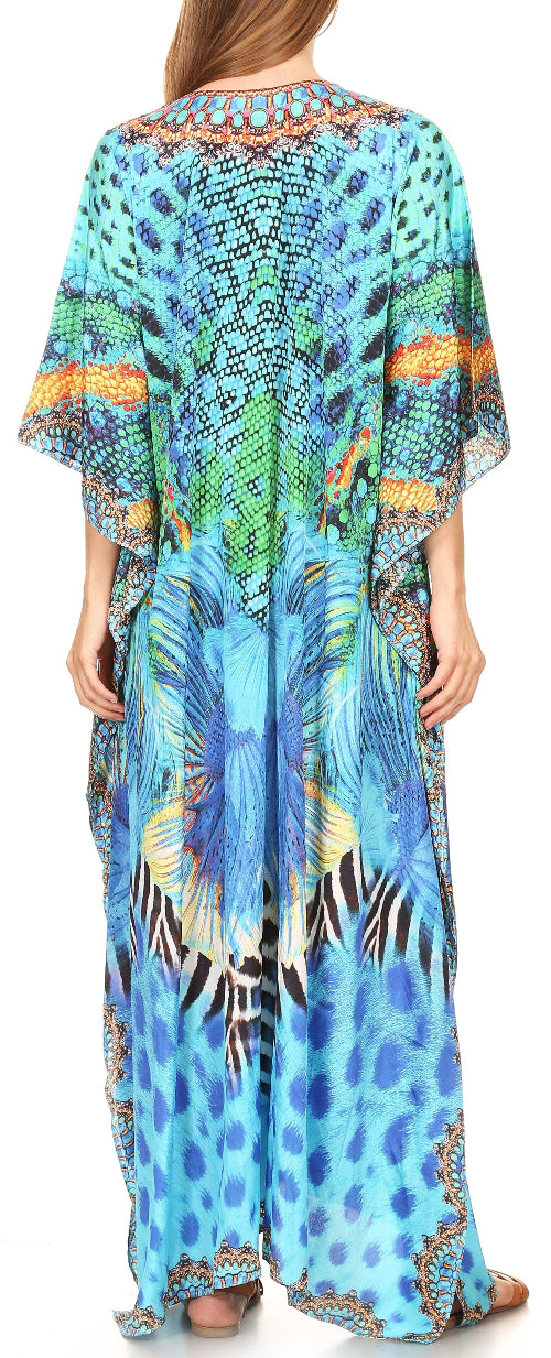 Woman wearing a colorful patterned kaftan dress with a blue base.
