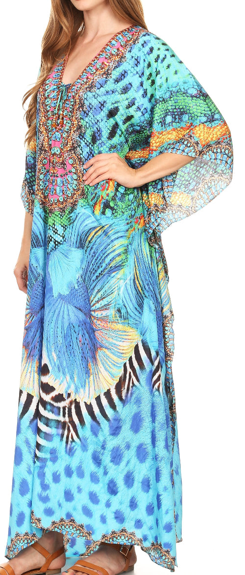 Woman wearing a colorful dress with butterfly design on a blue background