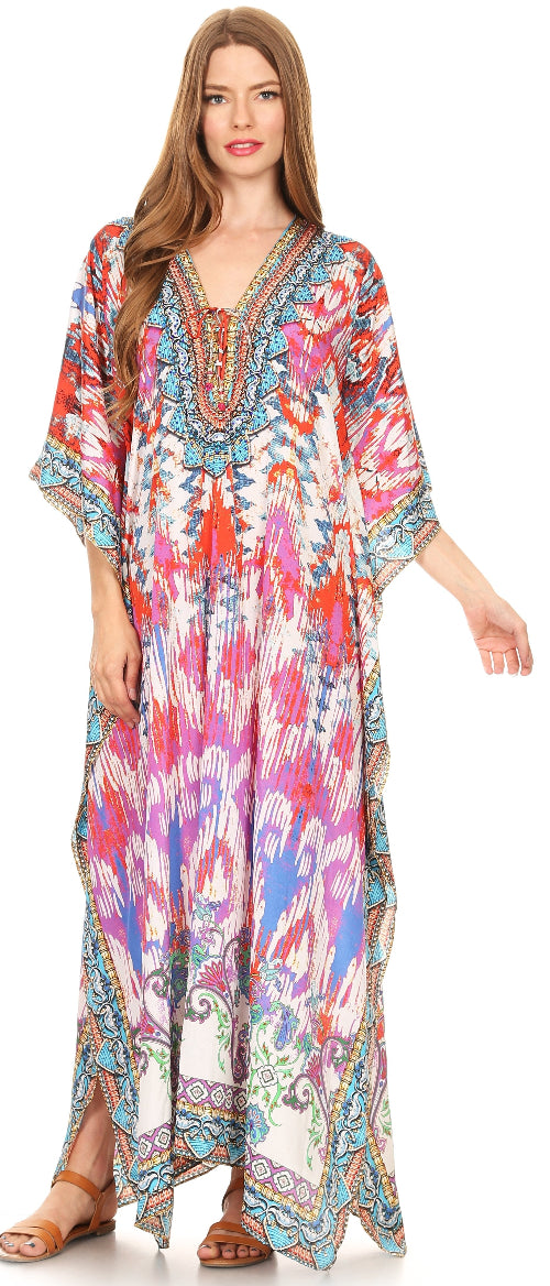 Woman wearing a colorful patterned dress with a white background