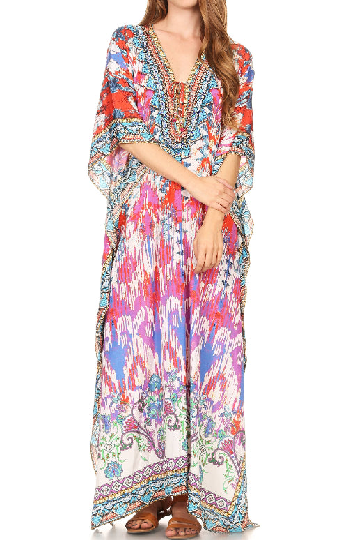 Woman wearing a colorful patterned dress on a white background