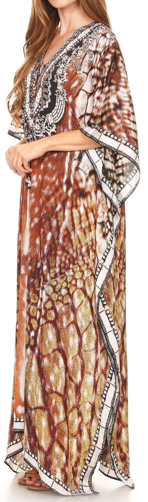 Woman wearing a patterned dress with a neutral background