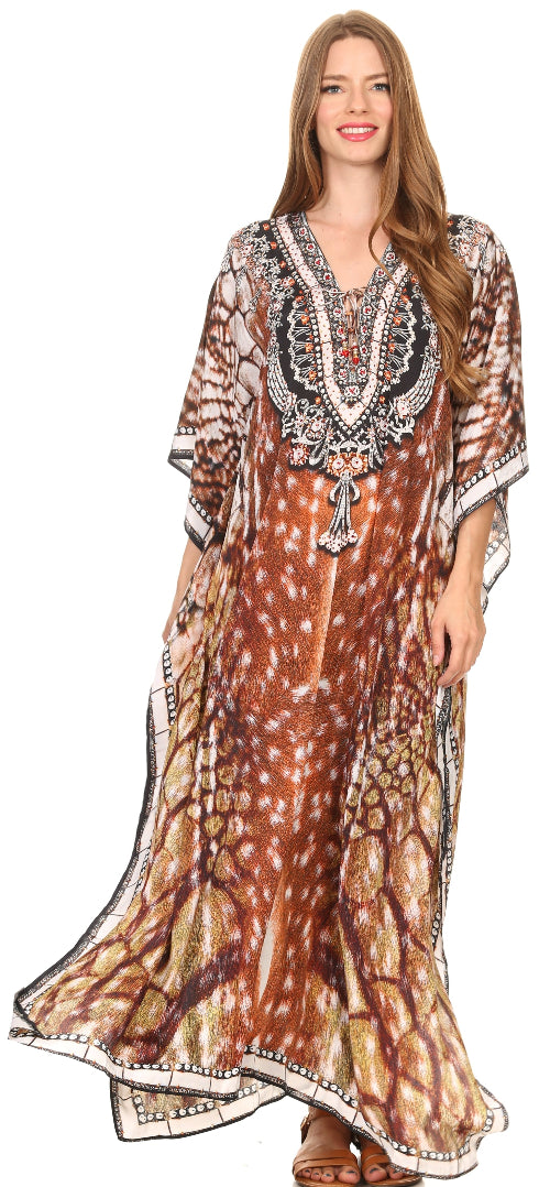Woman wearing a long, patterned dress with a white background