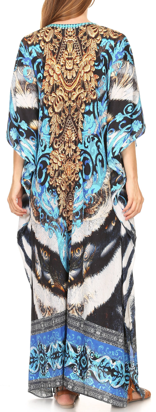 Long, patterned dress with abstract designs in blue, black, and white.