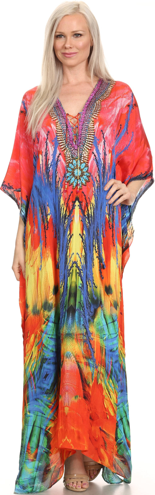 Woman wearing a colorful tie-dye dress with a vibrant pattern.