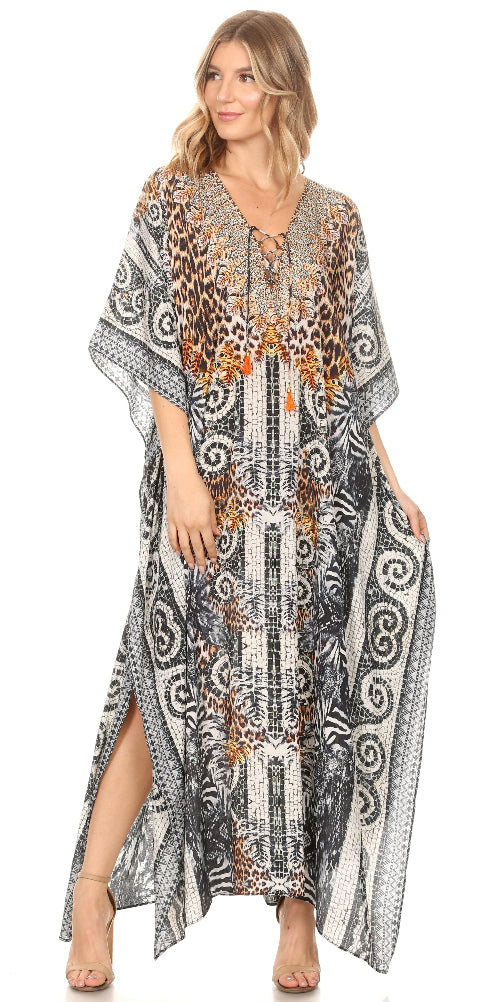 Woman wearing a long, patterned dress with a white background