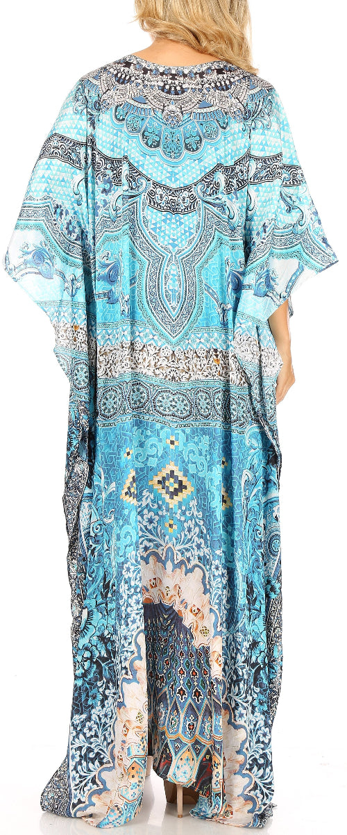 Blue patterned kaftan dress worn by a model on a white background
