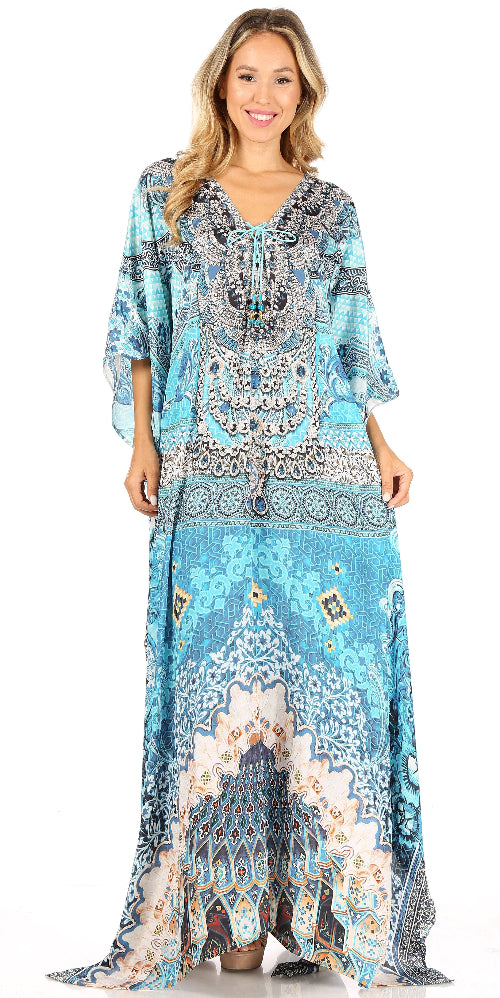 Woman wearing a blue patterned dress on a white background