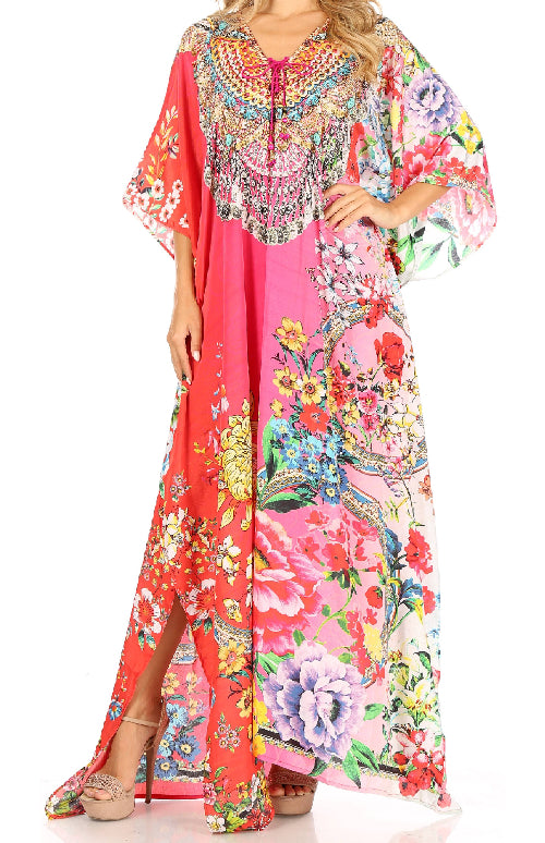 Woman wearing a colorful floral dress with a white background
