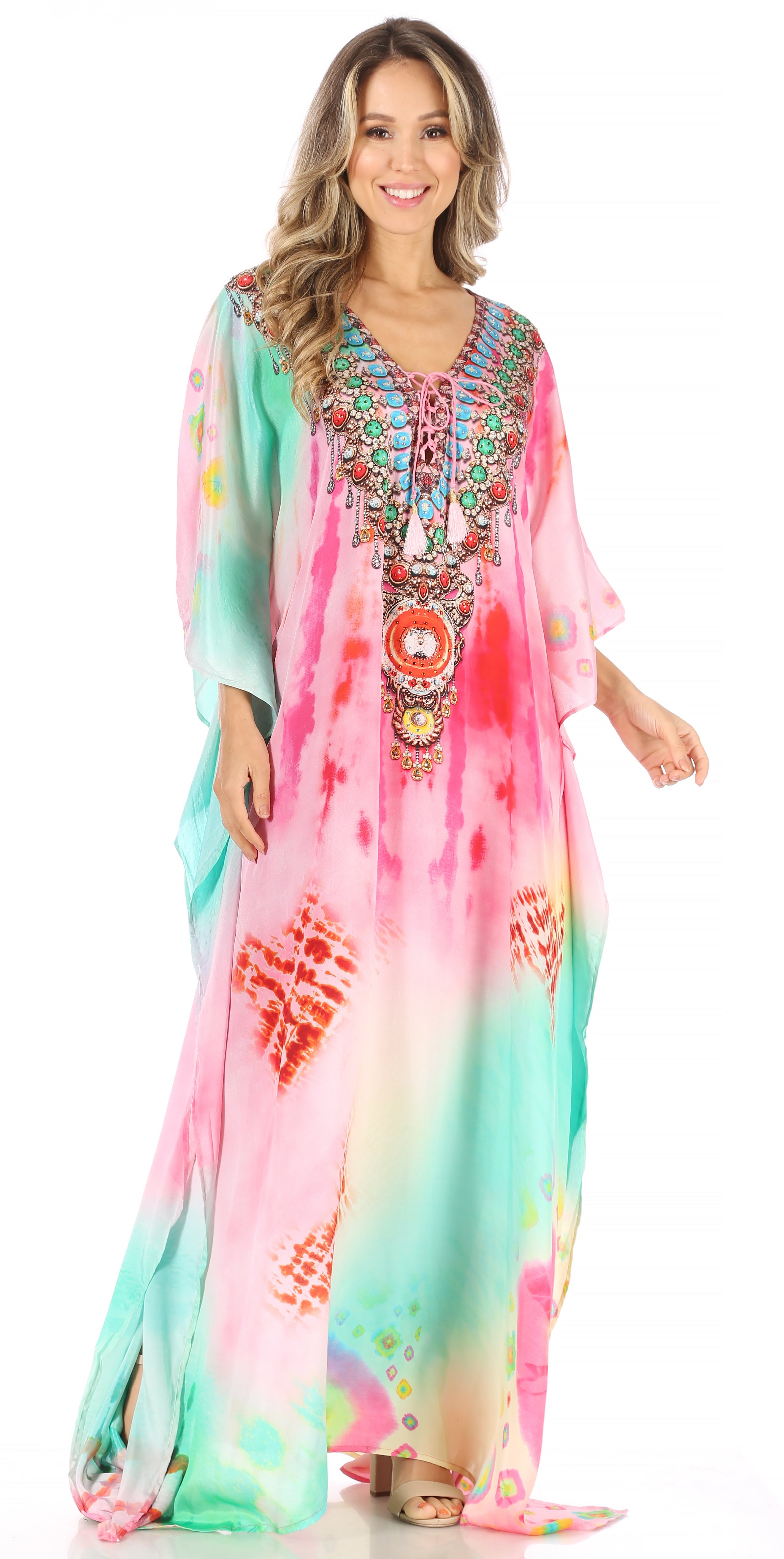 Woman wearing a colorful dress with intricate patterns and embroidery on a white background