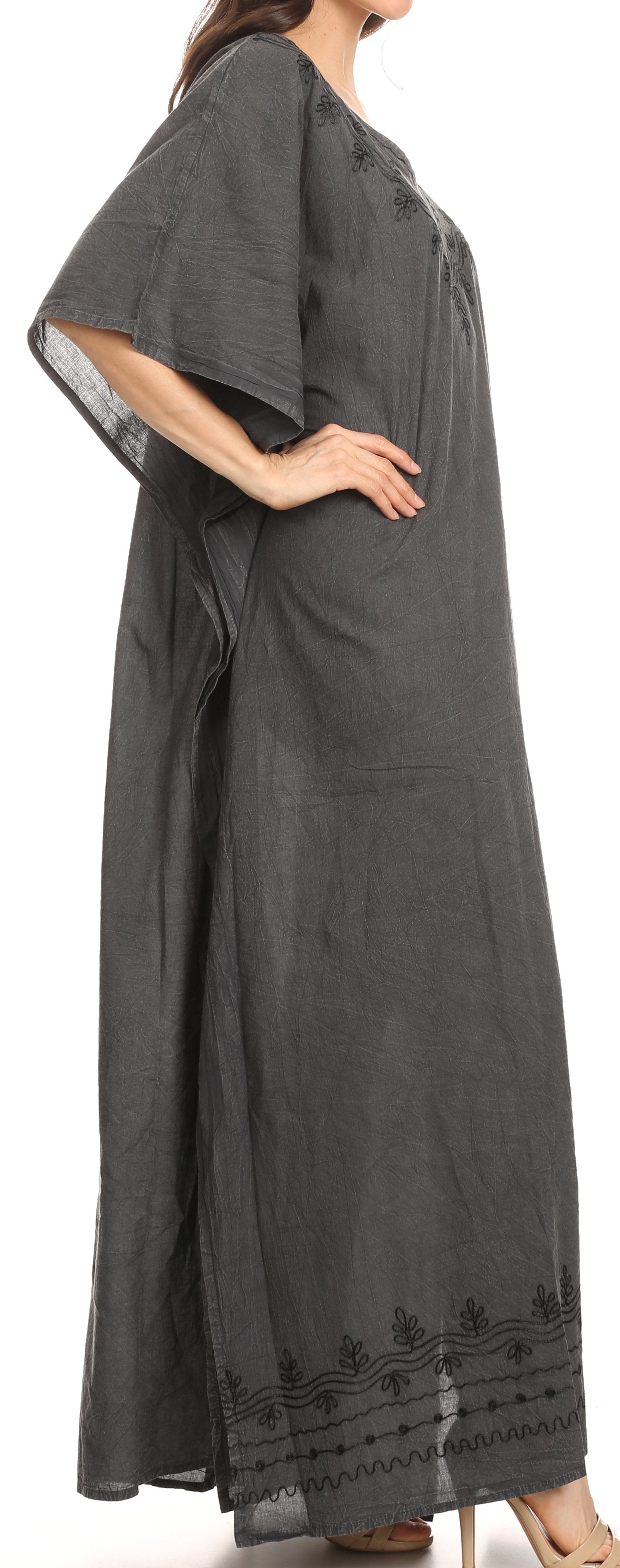Long dark gray dress with lace trim on a white background