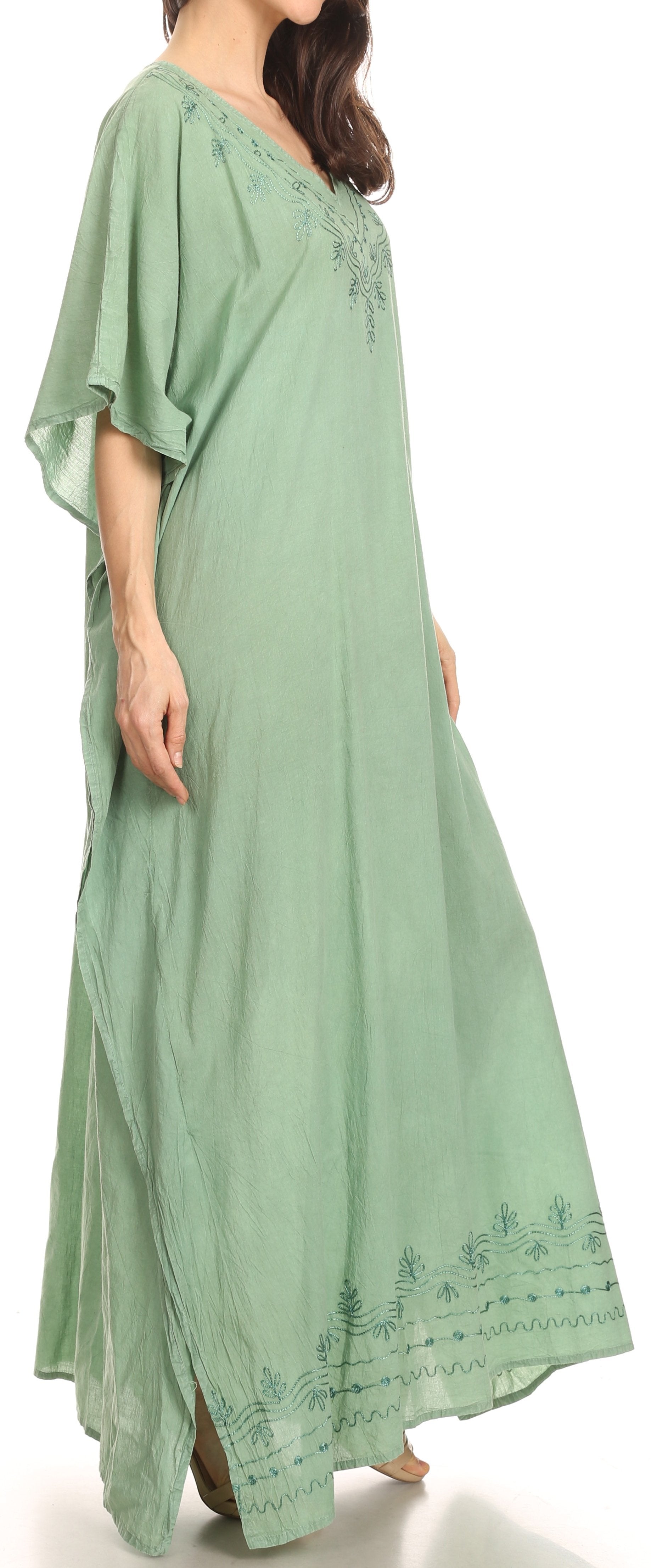 Light green dress with embroidery on a white background